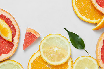 Image showing Close up of fresh orange, grapefruit, lime and lemon slices