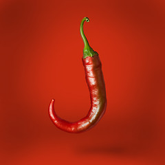 Image showing Hot chilli pepper floating over