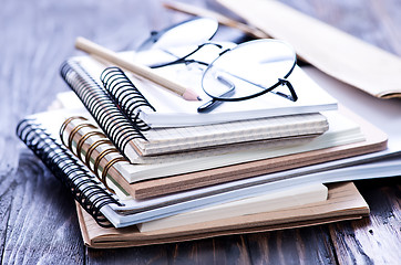 Image showing Stack of spiral notebooks