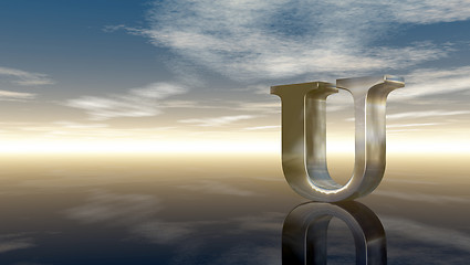 Image showing metal uppercase letter u under cloudy sky - 3d rendering