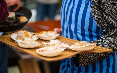 Image showing close up of scallop snacks garnish on seashell