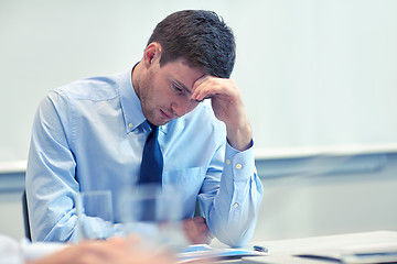 Image showing businessman having problem in office