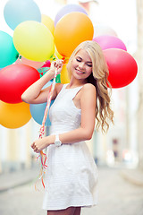 Image showing woman with colorful balloons