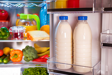 Image showing Open refrigerator filled with food