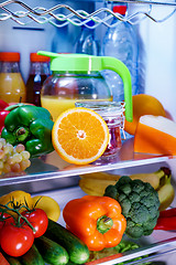 Image showing Open refrigerator filled with food