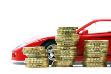 Image showing coins and red car