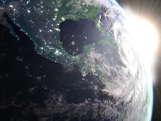 Image showing Hurricane Matthew during sunrise from space