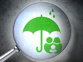 Image showing Security concept: Family And Umbrella with optical glass on digital background