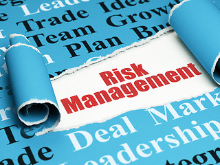 Image showing Finance concept: red text Risk Management under the piece of  torn paper