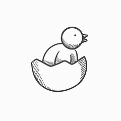 Image showing Chick peeking out of egg shell sketch icon.