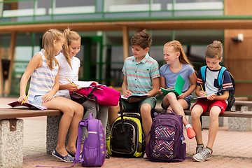 Image showing group of happy elementary school students outdoors