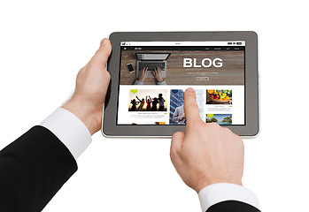 Image showing close up of man blogging on tablet pc