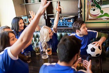 Image showing fans or friends watching football at sport bar