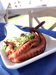 Image showing grilled octopus as seen in Greek Island Sifnos taverna 