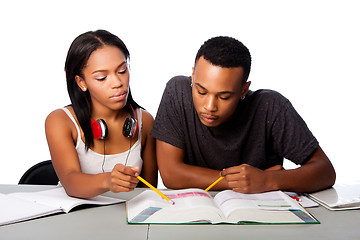 Image showing Students helping studying together