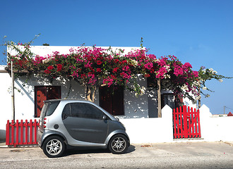 Image showing typical Sifnos Greek Island style house  bougainvillea flowers A