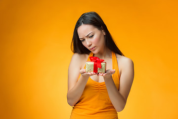 Image showing Chinese girl with a gift