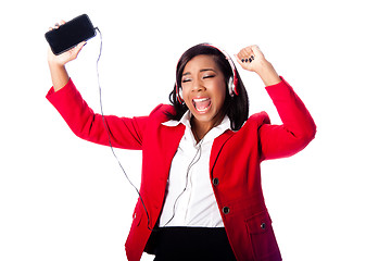 Image showing Business woman jamming listening to music