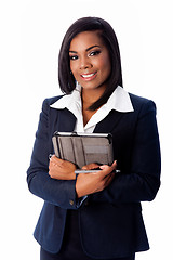 Image showing Smiling successful business woman standing with tablet