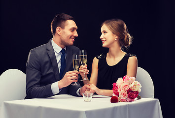 Image showing couple with glasses of champagne at restaurant