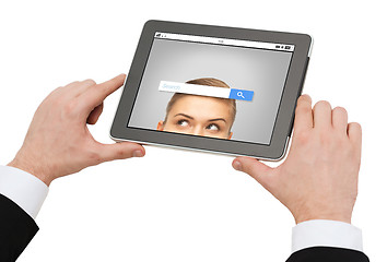 Image showing close up of hands holding tablet pc with