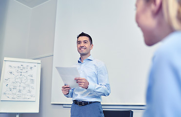 Image showing smiling business people meeting in office