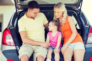 Image showing happy family with hatchback car outdoors