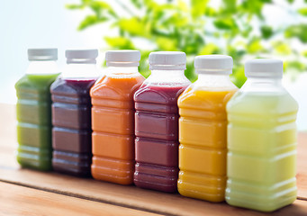 Image showing bottles with different fruit or vegetable juices