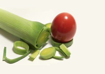 Image showing Red egg with garlic