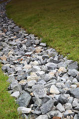 Image showing Stone and green grass