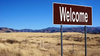 Image showing Welcome brown road sign