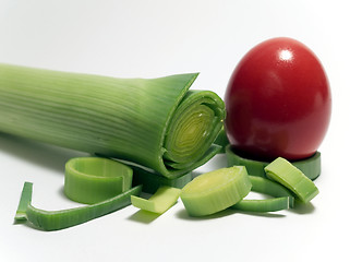 Image showing Red egg with leek