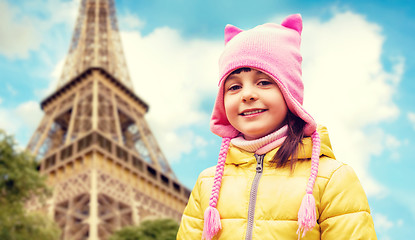 Image showing happy little girl over eiffel tower in paris