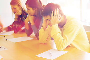 Image showing group of students with papers