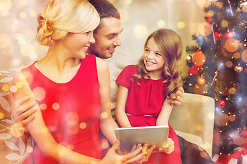 Image showing smiling family with tablet pc