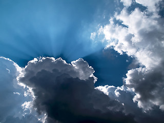 Image showing Light behind clouds