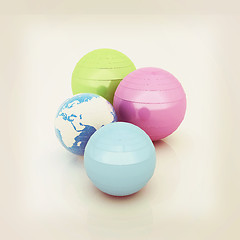 Image showing Pilates fitness ball and earth. 3D illustration. Vintage style.