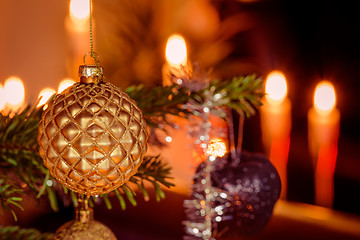 Image showing Golden Xmas ball and Christmas lights