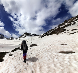 Image showing Hiker in snow mountain at sun day