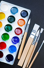 Image showing paint and brushes