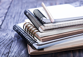 Image showing Stack of spiral notebooks