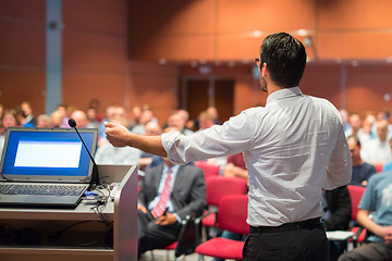 Image showing Public speaker giving talk at Business Event.