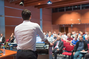 Image showing Public speaker giving talk at Business Event.