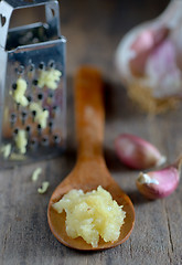 Image showing Garlic on wooden background