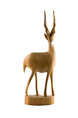 Image showing Deer wood sculpture isolated on white background
