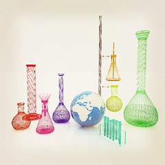 Image showing Chemistry set, with test tubes, and beakers filled with colored 