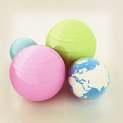 Image showing Pilates fitness ball and earth. 3D illustration. Vintage style.