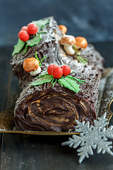 Image showing Homemade traditional Christmas log cake.