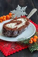 Image showing Sliced homemade Christmas chocolate yule log.