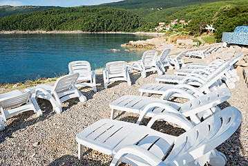 Image showing Pebble beach with chaise-longues in Istria